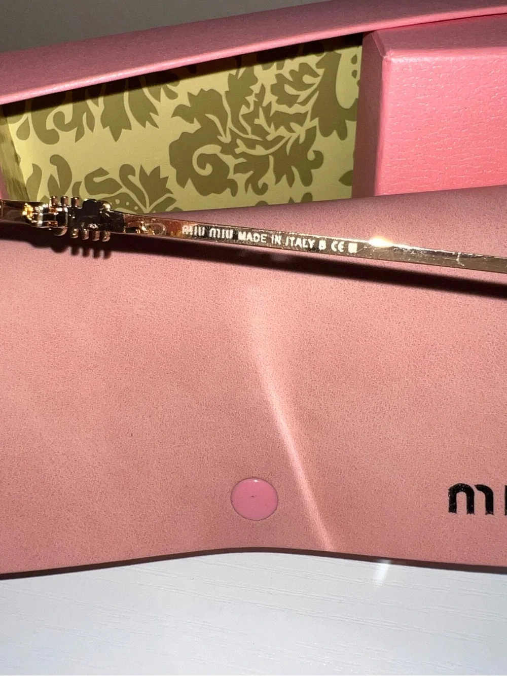 Miu Miu Gold Metal Round Sunglasses with Black Lenses